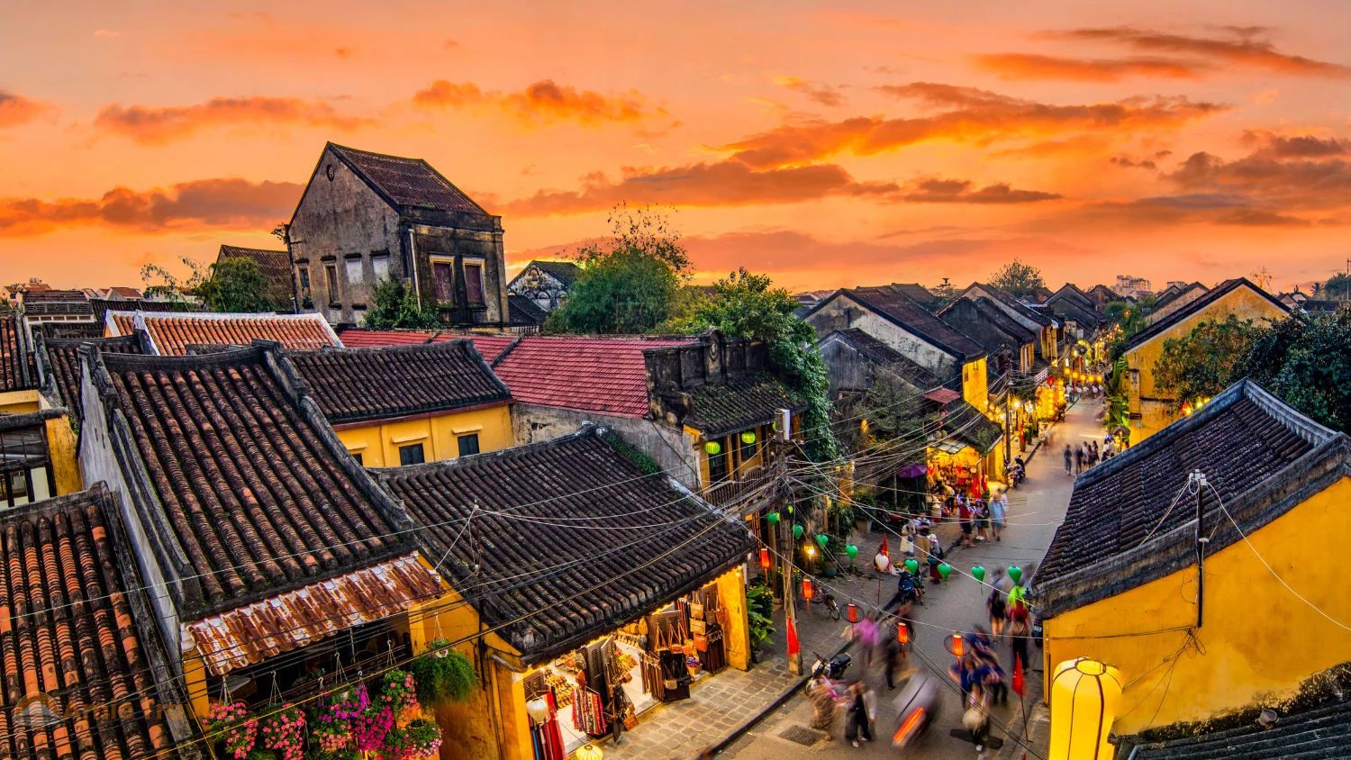 Hoi An Ancient Town best time to visit spring dry season golden light March April 2026 yellow facades lanterns quiet lane