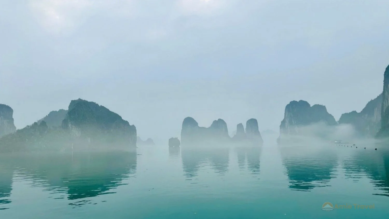 Ha Long Bay limestone karsts in morning winter mist
in January, UNESCO World Heritage Site northern Vietnam