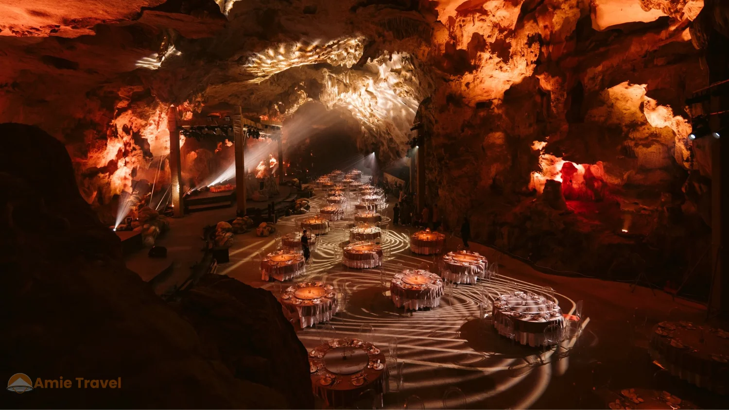 Dragon Pearl Cave interior dining tables limestone formations soft lighting live performance Asia Finest