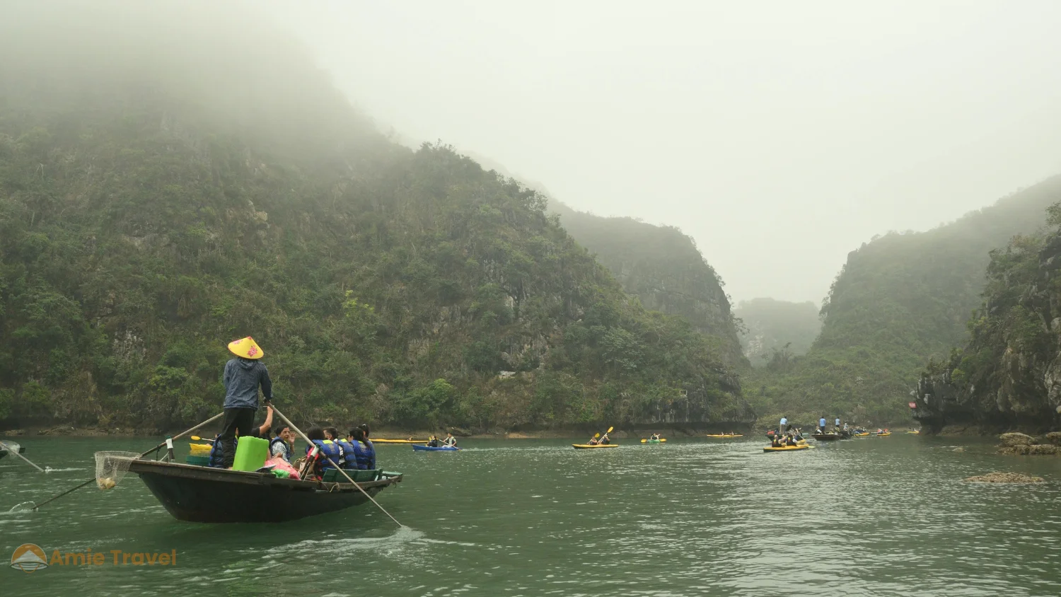 Ha Long Bay summer after rain mist rising limestone karsts atmospheric moody