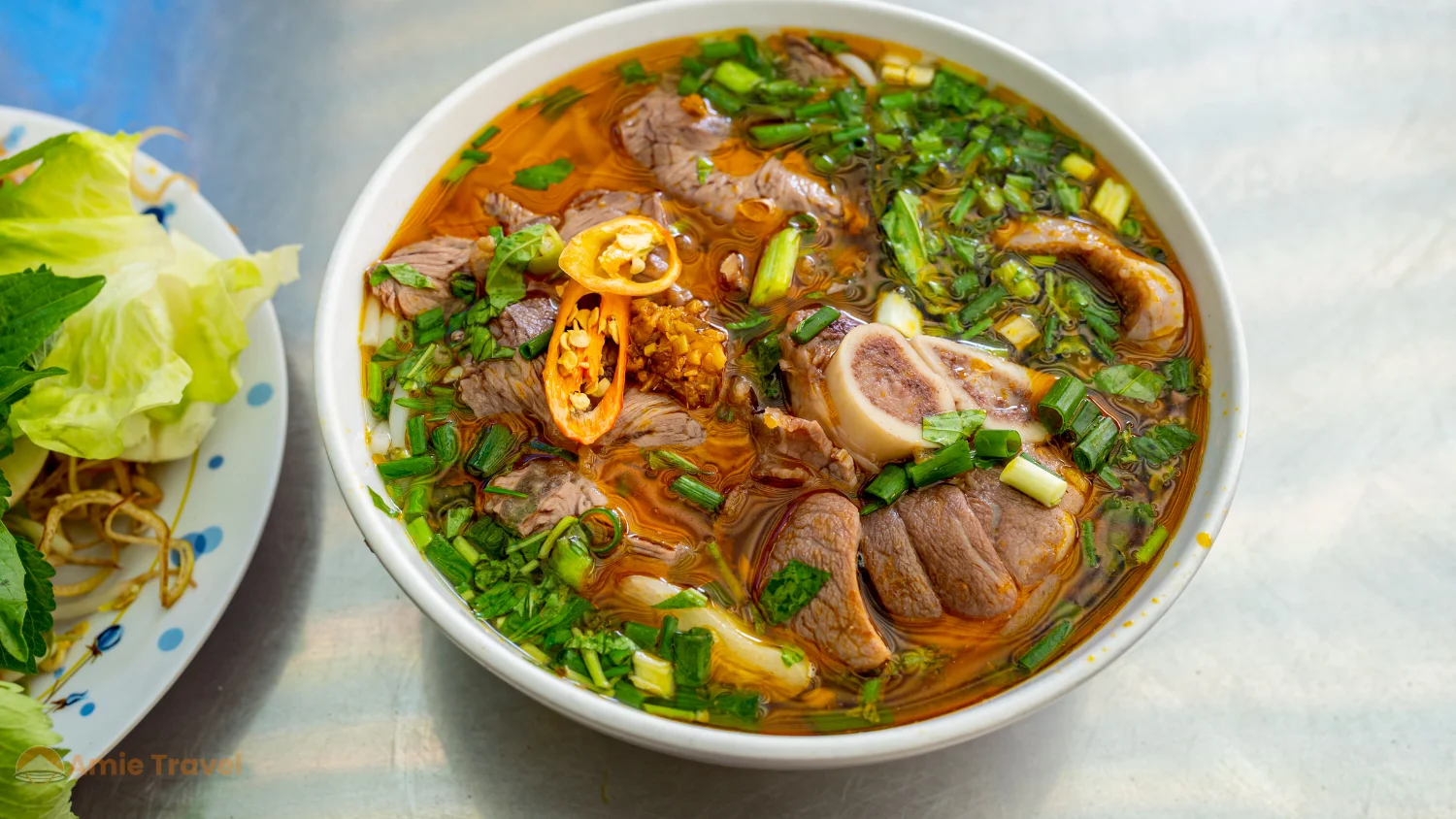 Hue bun bo noodle soup covered street restaurant morning steam local food culture