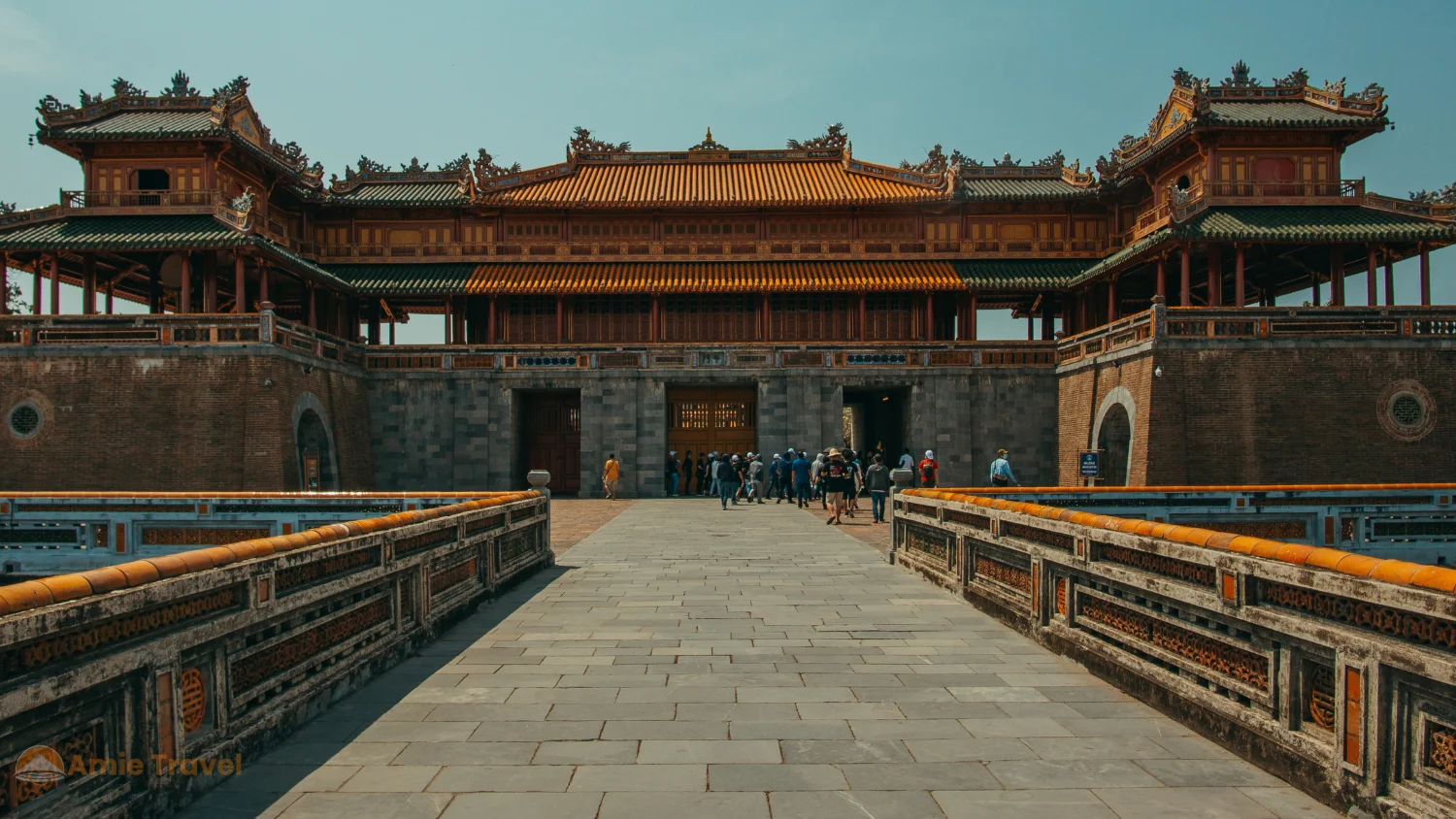 Hue Imperial Citadel February March clear blue sky yellow ochre walls red lacquer Ngo Mon Gate moat morning best time
