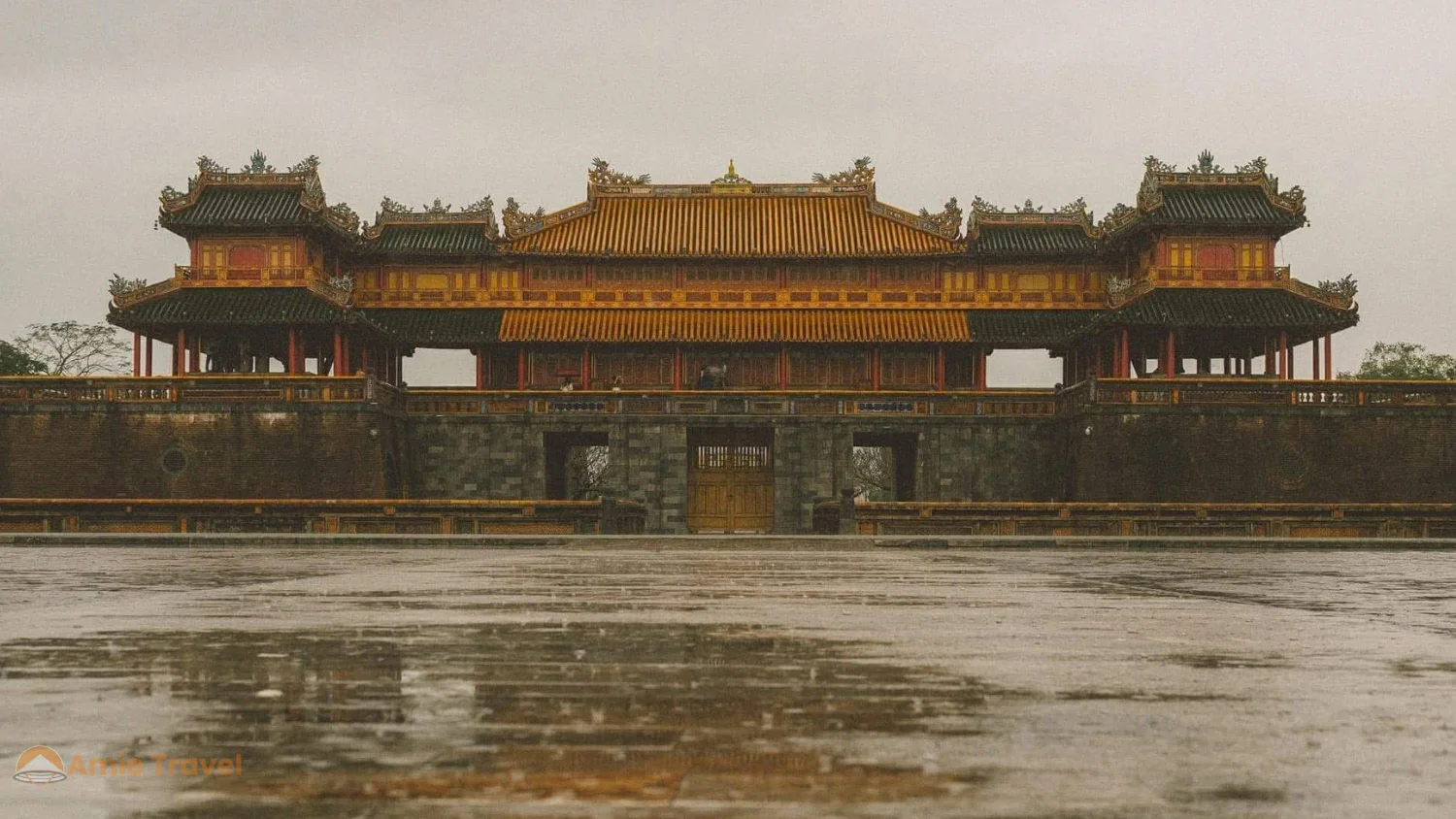 Hue Imperial Citadel rainy season October yellow ochre walls red lacquer atmospheric grey sky melancholy grandeur