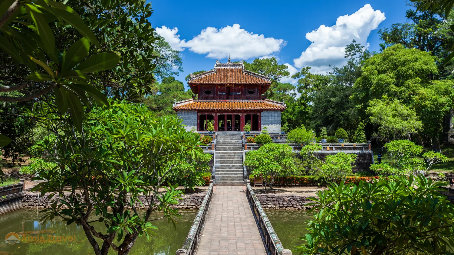 Minh Mang Royal Tomb garden pine trees pavilion lake dry season