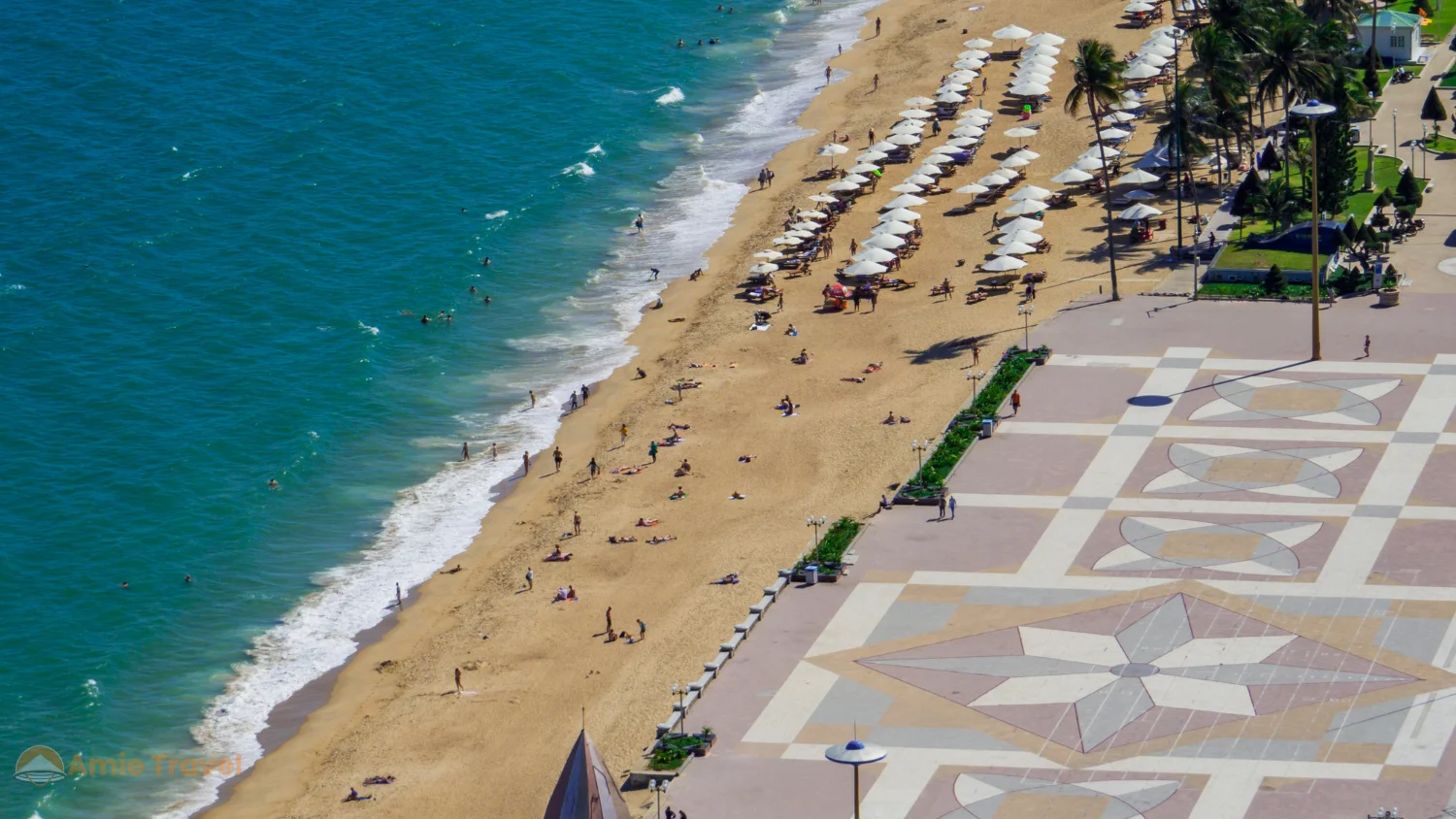 Nha Trang Tran Phu beach peak summer season colorful umbrellas clear sea energetic alive