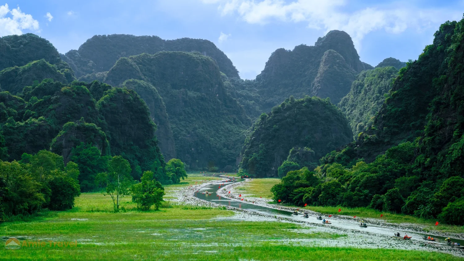 Tam Coc Ninh Binh high water season August September flooded rice fields karsts rowing boat dramatic different character