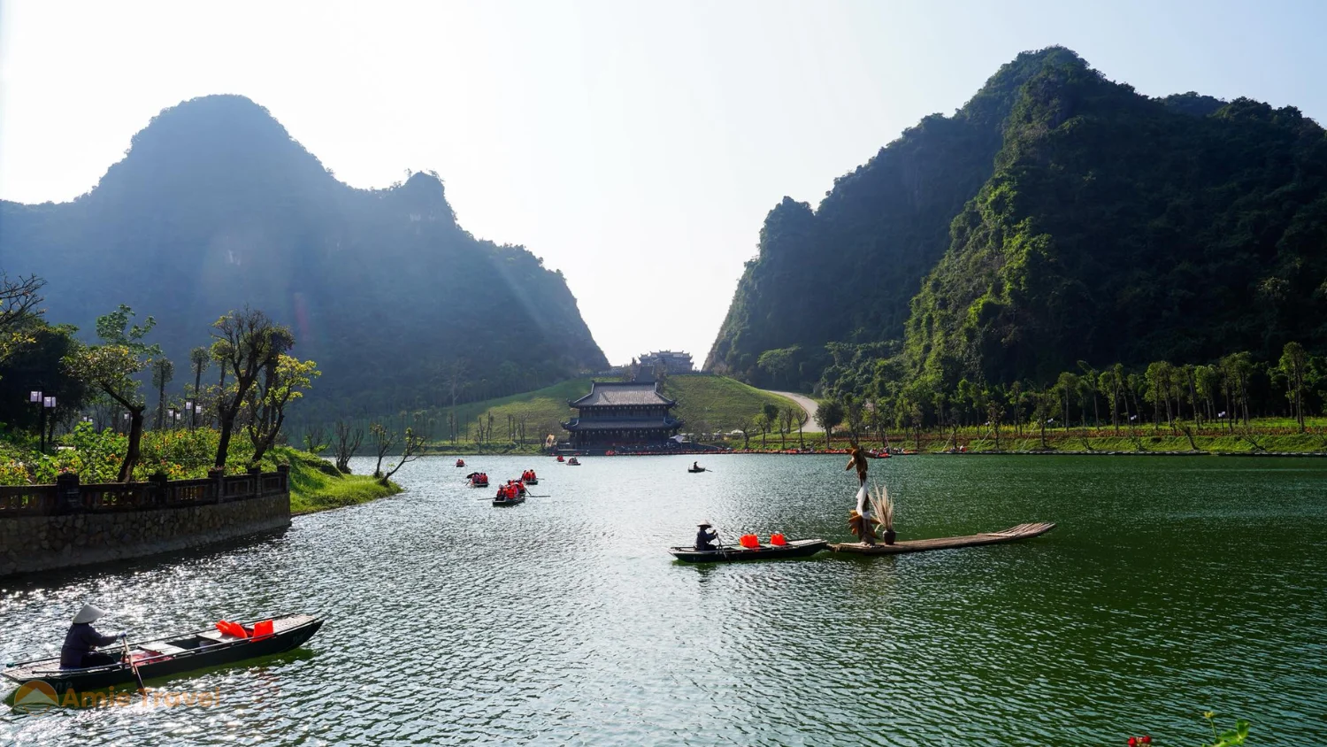 Thung Ui valley Ninh Binh still lake reflecting limestone karsts afternoon light new attraction Trang An complex