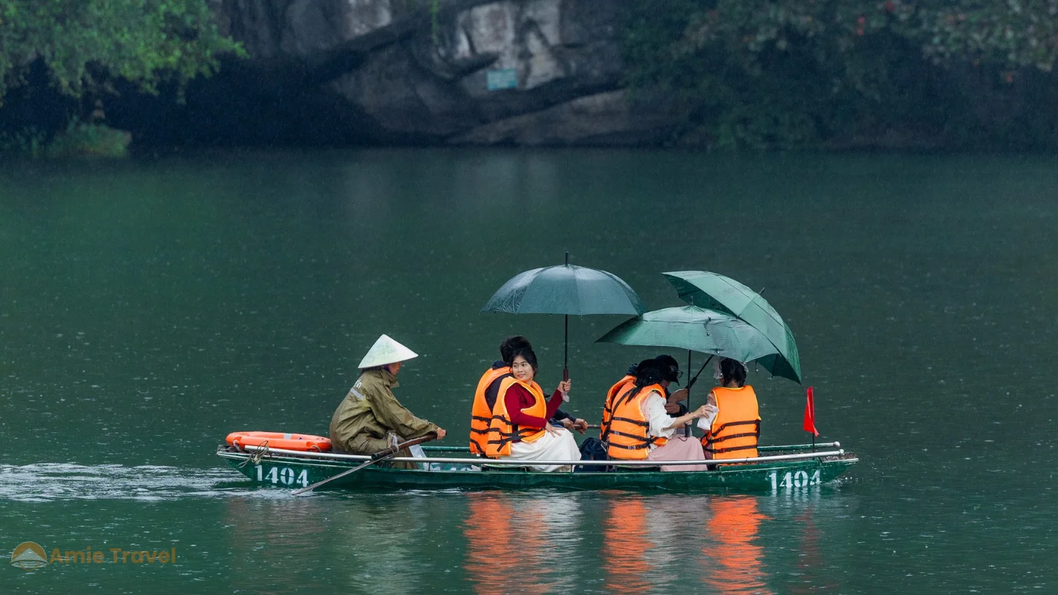 Trang An boat tour high water cave entrance summer season atmospheric